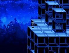 an image of a man standing on top of a tall building in front of the stars