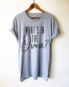 What's In The Oven T-Shirt - Pregnancy announcement shirt - Pregnancy reveal shirt - Cute Maternity Shirt - Gender Reveal Shirt Casual Long Sleeve T-shirt For Gender Reveal, Customizable Casual T-shirt For Gender Reveal, Cotton Maternity T-shirt For Gender Reveal, Gender Reveal Party Gifts, Cheap Custom Text T-shirt For Pregnancy Announcement, Cheap Bump Friendly T-shirt For Pregnancy Announcement, Cute Maternity Shirts, Unique Pregnancy Announcement, Pregnancy Reveal Shirt