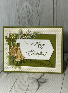 a christmas card with a bell on it