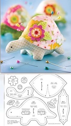 an image of a paper model of a turtle with flowers on it's shell