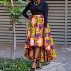 Our Beautiful tailored Maxi Skirt is made with high quality fabric. The Maxi Skirt  is perfect for both social and religious event. Please note that same fabric on model is currently not available, kindly choose from the other options provided and attach the number to order as note. All outfits are made to order and can be custom fitted, to make this dress your perfect fit please leave your waist, hips, skirt length measurements in the note to seller section when you order. Please feel free to start a conversation here on Etsy. Thank you for visiting our shop. African Flared Skirt, African Skirts Long, Multicolor Fitted Long Wrap Skirt, Orange Full Skirt, Fitted Multicolor Asymmetrical Skirt, Multicolor Asymmetrical Lined Skirt, Multicolor Pleated Long Skirt, Multicolor Flowy Asymmetrical Skirt, High Low Skirt Outfit