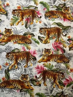 an image of tigers and tropical leaves on a white background with pink, green, yellow and red flowers