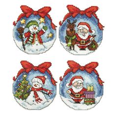 four cross stitch christmas ornaments with santa and reindeer