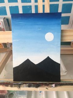 an acrylic painting of mountains with a full moon in the sky