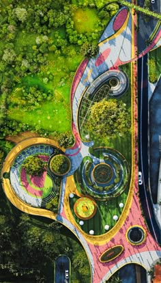 an aerial view of a colorful park with trees