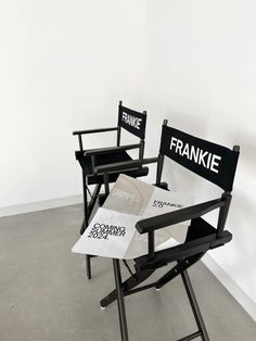 two black chairs sitting next to each other in front of a white wall with the words frank frank frank frank frank frank frank frank frank frank frank frank