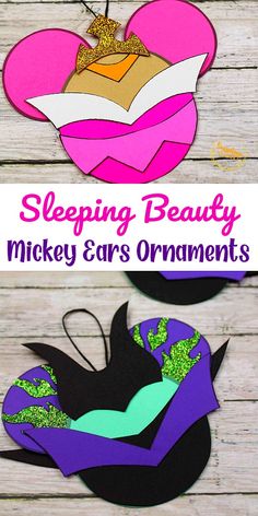 an image of sleeping beauty mickey ears ornament made out of cardboard and paper