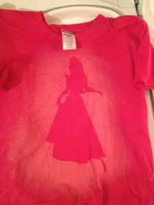 a t - shirt with the silhouette of a princess on it