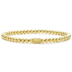 An 18K gold signature Caviar beaded bracelet.