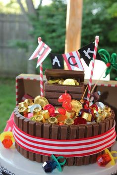 a birthday cake decorated with chocolate and candies