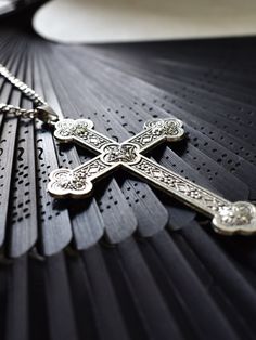 Embrace the cyberpunk, gothic, steampunk, and retro vibes with our unique cross necklace. This single necklace captures the essence of multiple alternative fashion styles, making it a versatile and edgy accessory. Add a touch of mystery and individuality to your look with this statement piece.   Please note that this product includes only the necklace. Spiritual Metal Pendant Cross Necklace, Spiritual Metal Cross Pendant Necklace, Spiritual Metal Cross Necklace, Punk Style Metal Cross Jewelry, Handmade Punk Style Cross Jewelry, Vintage Metal Cross Pendant Necklace, Gothic Metal Cross Necklaces, Gothic Cross Pendant Necklace With Engraving, Vintage Metal Crucifix Cross Necklace