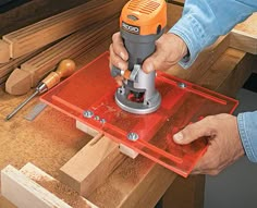 a person using a sander on a piece of wood