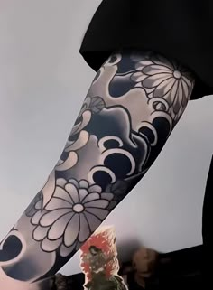 a person with a tattoo on their arm