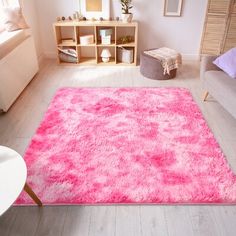 a bright pink area rug in a living room