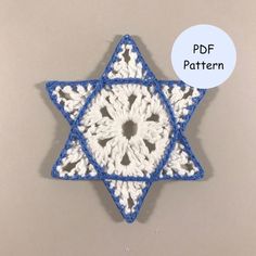 a blue and white crocheted star ornament with the word pattern below it