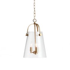 a glass and brass chandelier with three lights hanging from the bottom, on a white background