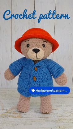 a teddy bear wearing a blue jacket and red hat with the words paddington written on it