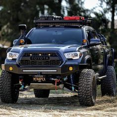 the front end of a black toyota truck