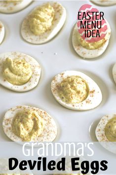 an image of deviled eggs on a baking sheet with the words, easter menu idea grandma's deviled eggs