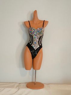 SAMBA FACTORY Lovely handmade Sequin / Beads / Crystal Design Bodysuit/Leotard. Closed back. ( See pictures ) Perfect as a Samba or Dance competition Leotard/Bodysuit or for Stage Performance ! This listing is for : Sequins / Beads /Crystal stones BLACK / SILVER color Sequin Design Bodysuit, closed back.  ( Please see all pictures ! ) We have many more colors of this gorgeous leotards in stock, please browse in our store ! Dress size : S + M, Fits perfect for AU/UK Size 6 + 8 !  Equivalent to US Cabaret Costume, Carnival Show, Competition Leotard, Show Girl, Samba Costume, Sequin Bodysuit, Leotard Bodysuit, Sequin Design, Stage Performance