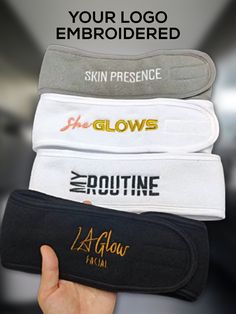 four different colored headbands with the words, your logo embroidered on them