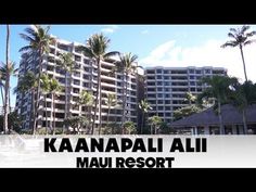 the kaanapai alii resort is located on the beach in front of palm trees