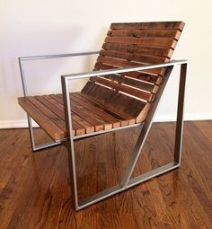 a wooden chair sitting on top of a hard wood floor