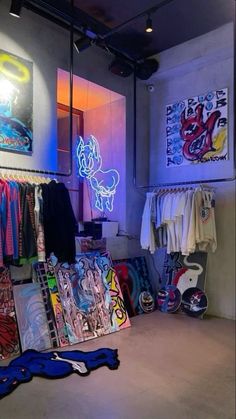 a room filled with lots of clothing and neon lights