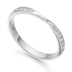 a white gold wedding ring with diamonds on the sides and a curved design in the middle