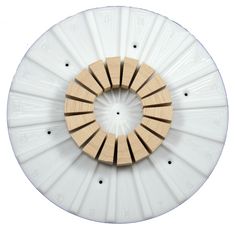 a circular object made out of wood and plastic