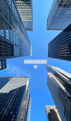 looking up at skyscrapers in new york city