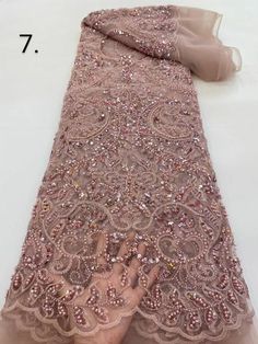 This high quality Fabric is measured in 5 Yards With Embroidered Beading and Sequin. It is soft, very delicate and beautiful. This high Quality Fabric is made with Fashion embroidered rhinestones can be used in making party wedding dresses, skirts, shawls, scarves and other other fashion apparels as you would like. Size : Length : 5 yards (180 inch). Width: 50 inch (Please allow slight deviation for the measurement data ,±1 inch) Material: 100% Polyester, Tulle Lace Fabric, Eco-Friendly embroide Luxury Pink Sequin Fabric With Zari Work, Luxury Festive Sequin Fabric With Sheer Dupatta, Luxury Gold Sequin Fabric For Evening, Pink Beaded Embroidered Fabric For Party, Elegant Pink Embroidered Sequin Fabric, Pink Lace Fabric With Rhinestones Embroidery, Pink Beaded Lace Embroidered Fabric, Pink Embroidered Fabric With Rhinestones For Wedding, Pink Rhinestone-embroidered Lace Fabric