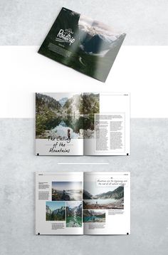 an open magazine with mountains and water in the background, on top of a white surface