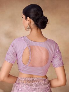 This exquisite lavender net saree is intricately adorned with threadwork, sequin embellishments, and zarkan details. Designed to offer a perfect blend of tradition and contemporary style, this saree promises to be a showstopper at any event. The delicate lavender hue exudes a sense of grace and sophistication, making it an ideal choice for parties, receptions, and other special occasions. The fine craftsmanship involved in the thread work adds a touch of elegance, while the sequin and zarkan wor Net Saree Blouse Designs, Net Saree Blouse, Embellished Saree, Sleeveless Blouse Designs, Netted Blouse Designs, Net Blouse, Latest Blouse Designs Pattern, New Saree Blouse Designs, Latest Model Blouse Designs