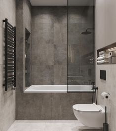 a bathroom that has a toilet and a bathtub in it, with a glass shower door