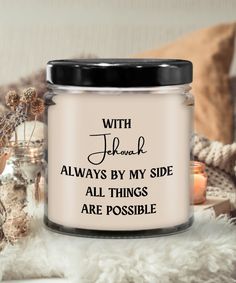 a candle with the words, with frank always by my side all things are possible