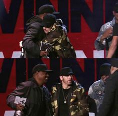 two men are hugging each other while one is wearing a black hat and the other wears a camo jacket