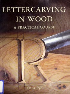 the cover of a book with an image of a pair of scissors and a piece of wood