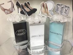 an assortment of women's shoes and perfume bottles