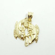 (100% AUTHENTIC) 10k yellow gold Pisces zodiac pendant charm. "Comes with a gift box" 10K yellow Solid Gold pendant charm. Solid 10K gold, not plated. Nicely polished and shiny. Stamped 10K for Authenticity. ADDITIONAL INFO: REAL 10K Yellow Gold. Polished, Shiny 1.9 grams. 0.50 inches top to bottom without bail (longest point). 0.42 inches left to right. (Widest Point). Please refer to the photo of the item next to a quarter for comparison purposes. Ask me any questions you may have before make a purchase. Shipping: Your order will be professionally packed and shipped. US free shipping is for the 48 Continental states. For shipping to Alaska, Hawaii and Puerto Rico please contact us for a quote. We also offer overnight shipping for the cost of $25.00 which the estimated delivery time is on Pisces Fish, Pisces Jewelry, Medical Jewelry, Zodiac Pendant, Pisces Zodiac, Unisex Jewelry, Fine Jewelry Gift, Fine Jewellery Necklace, Gift Jewelry