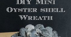 a pile of oyster shells sitting on top of a wooden table