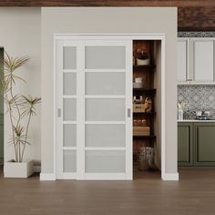 an open pantry door in the middle of a kitchen