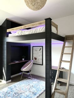 there is a loft bed with a desk and ladder in the corner next to it