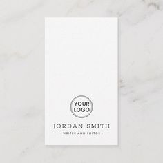 a white business card with the words your logo on it and a black circle in the middle