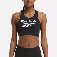 Represent Reebok every day of the week. You don't need to be headed to the gym to appreciate this sports bra. Stretchy cotton is soft comfortable and provides light support for all the things you do. The racerback gives you plenty of room to move. A bold Vector logo keeps it sporty and rooted in heritage. Black Reebok, Womens Reebok, Black Bralette, Day Of The Week, Hem Style, Bra Cups, Vector Logo, The Things, Fitness Fashion