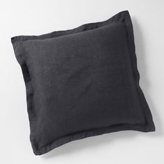 black linen pillow on white background