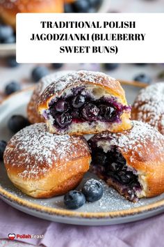 traditional polish kagodannik blueberry sweet buns on a plate with powdered sugar