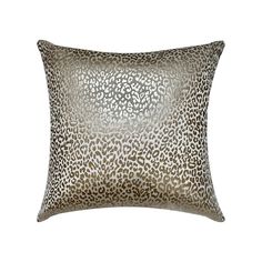 a leopard print pillow with silver foil on the front and back, it has a square shape