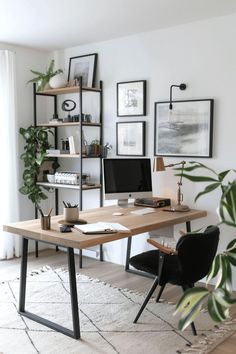 a home office with black and white decor