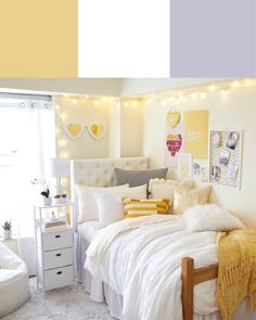 a bed with white sheets and pillows in a room decorated for valentine's day